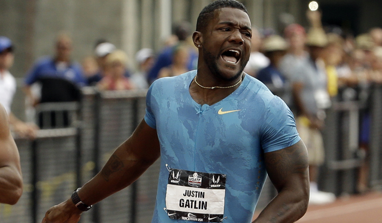 Justin Gatlin celebrates after winning the 200m race at the US Track and Field Championships in Eugene on Sunday. Photo: AP