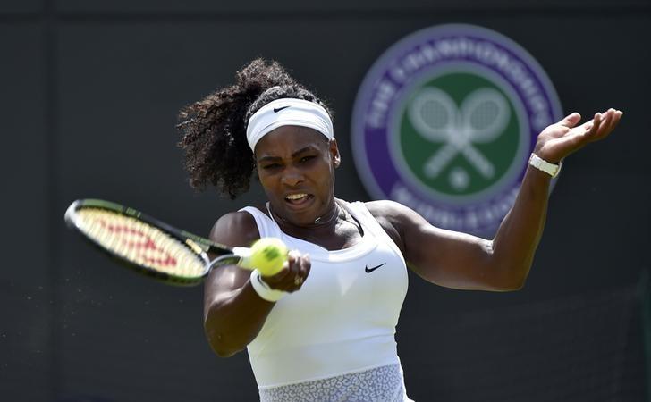 Serena Williams of U.S.A. plays a shot during her match against Margarita Gasparyan of Russia at the Wimbledon Tennis Championships in London, June 29, 2015.  REUTERS/Toby Melville