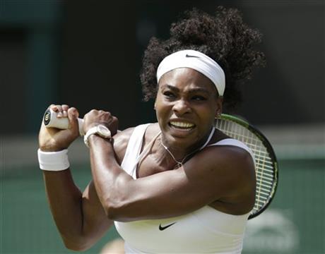 Serena Williams of the United States plays a return to Margarita Gasparyan of Russia during their women's singles first round match at the All England Lawn Tennis Championships in Wimbledon, London, Monday June 29, 2015. AP