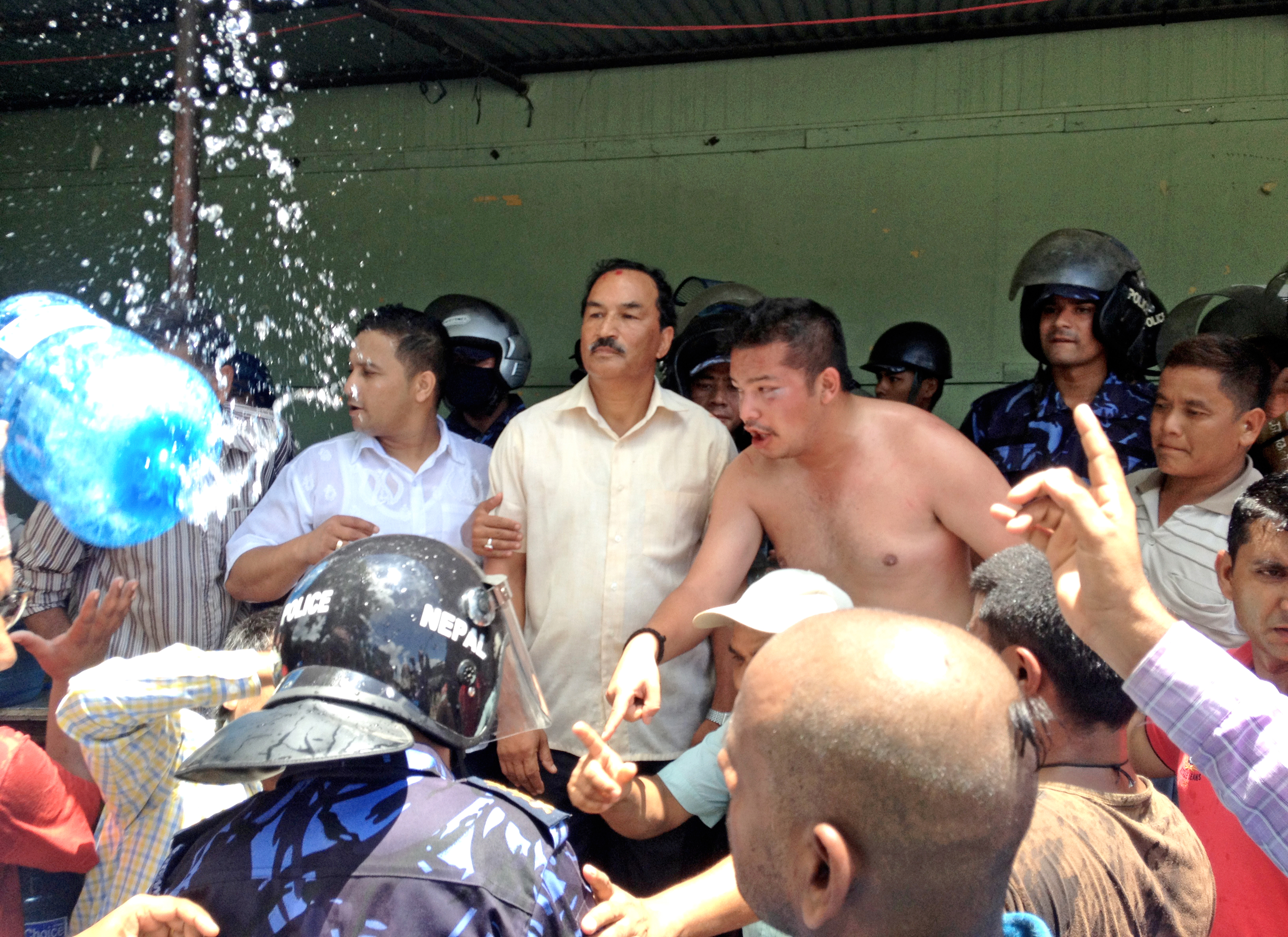 Ganesh Thapa's son Abishek and RPP-N Chairman Kamal Thapa protesting police action against RPP-N activists outside a feedback collection centre in Hetauda, on Tuesday.