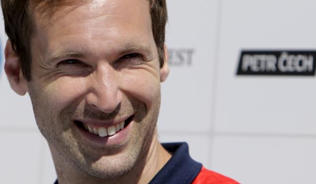 Czech soccer player Petr Cech smiles during a news conference in Prague July 1, 2015. REUTERS/David W Cerny n.
