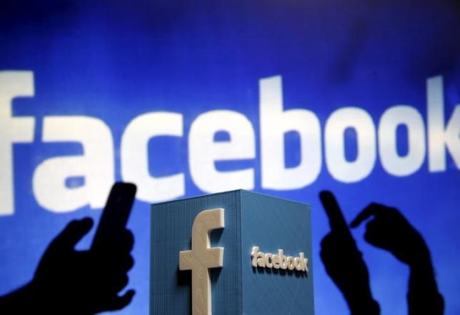 A 3D plastic representation of the Facebook logo is seen in this illustration in Zenica, Bosnia and Herzegovina, May 13, 2015. REUTERS/Dado Ruvic