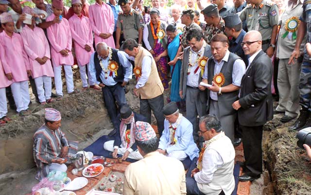 Prime Minister Sushil Koirala along with leaders of the four major parties jointly laying the foundation stone of late Girija Prasad Koirala Memorial Building, in Bhadrapur, Jhapa, on Monday. Photo: THT