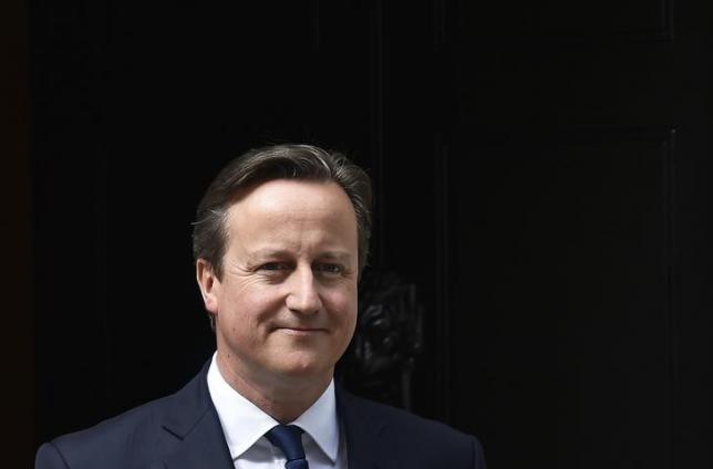 Britain's Prime Minister David Cameron waits to greet his Ukrainian counterpart Arseniy Yatsenyuk at Number 10 Downing Street in London, Britain July 15, 2015. REUTERS/Toby Melville