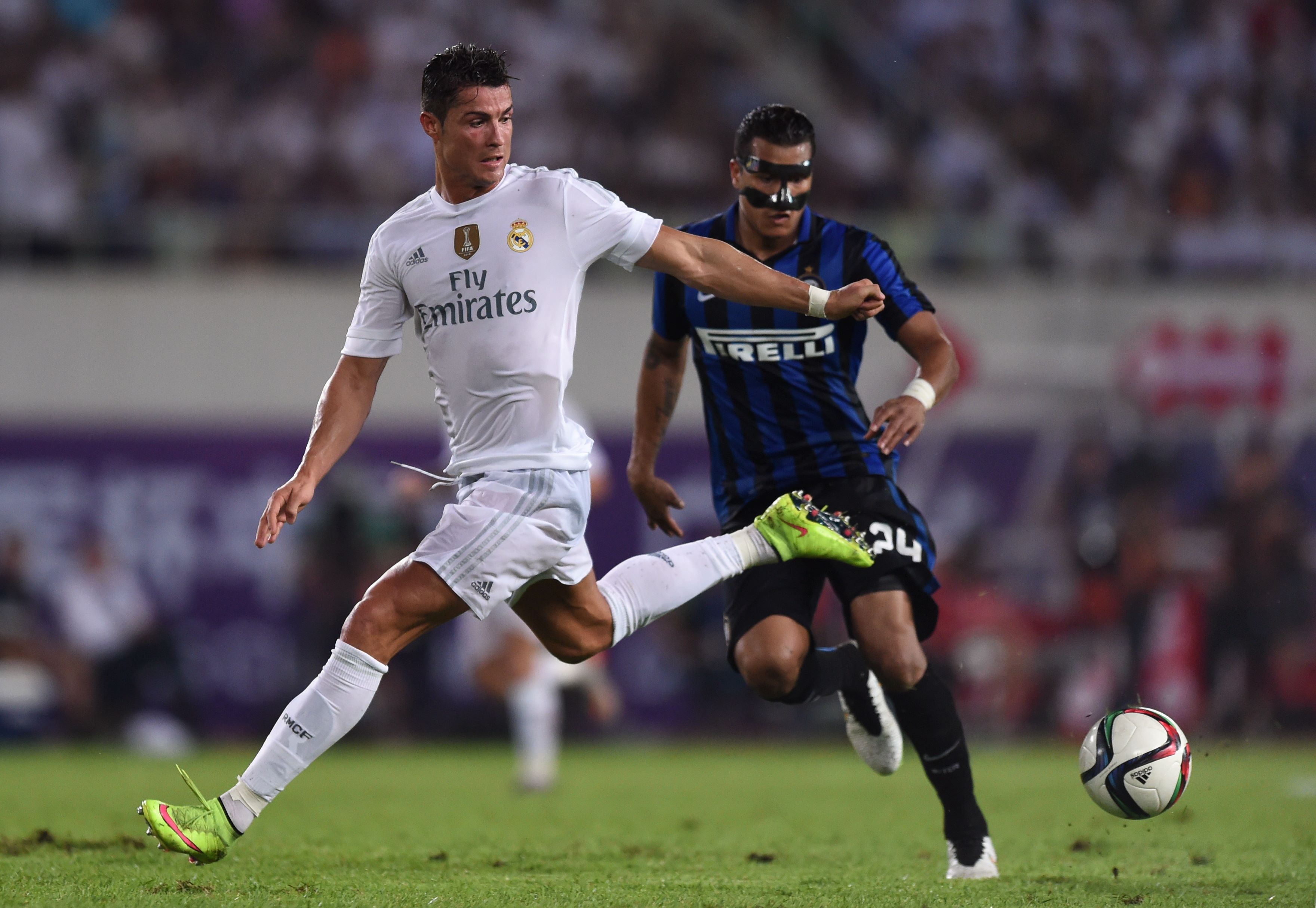 Real Madrid's Cristiano Ronaldo (left) and Inter Milan's Jeison Murillo vie for the ball during their International Champions Cup match in Guangzhou on Monday. Photo: AFP