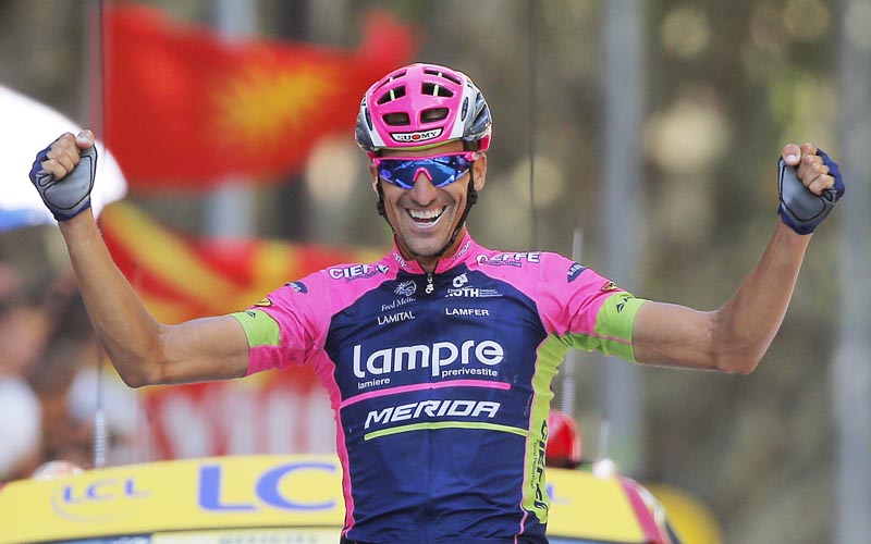 Spain's Ruben Plaza Molina celebrates as he crosses the finish line to win the 16th stage of the Tour de France from Bourg-de-Peage to Gap on Monday. Photo: AP