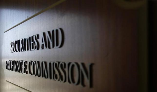 A sign for the Securities and Exchange Commission (SEC) is pictured in the foyer of the Fort Worth Regional Office in Fort Worth, Texas June 28, 2012. REUTERS/Mike Stone