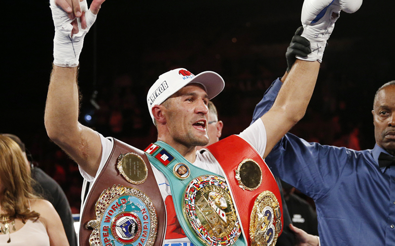 Sergey Kovalev celebrates after defeating Nadjib Mohammedi in their light heavyweight title boxing bout on Saturday. Photo: AP