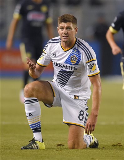 Los Angeles Galaxy midfielder Steven Gerrard, of England, gestures after taking a fall during the first half of an International Champions Cup soccer match against Club America, Saturday, July 11, 2015, in Carson, Claif. (AP Photo/Mark J. Terrill)