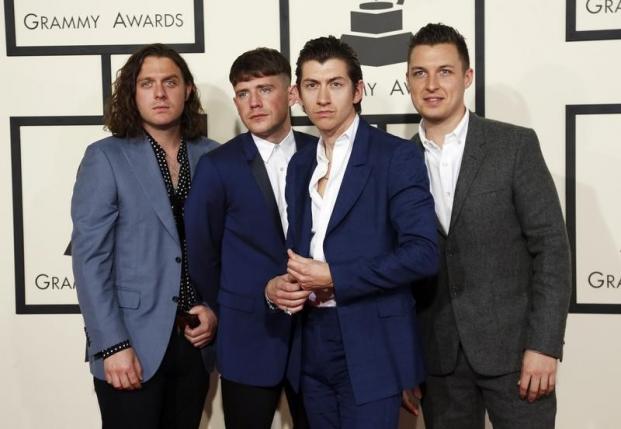 Musical group The Arctic Monkeys arrive at the 57th annual Grammy Awards in Los Angeles, California February 8, 2015.  REUTERS/Mario Anzuoni /files