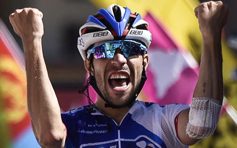 France's Thibaut Pinot celebrates as he crosses the finish line at the end of the 110,5 km 20th stage of the 102nd edition of the Tour de France from Modane Valfrejus to Alpe d'Huez on Saturday.