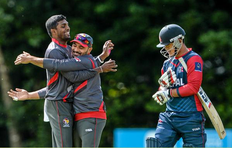 The UAE players celebrate after dismissing Nepal's Sagar Pun during their practice match in Stormont, Ireland on Tuesday. Photo: ICC