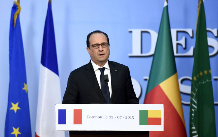 French President Francois Hollande delivers a speech to parliamentarians and institutions' representatives in Cotonou on July 2, 2015. Hollande is on two-day African tour to Benin, Angola and Cameroon. Photo: AFP