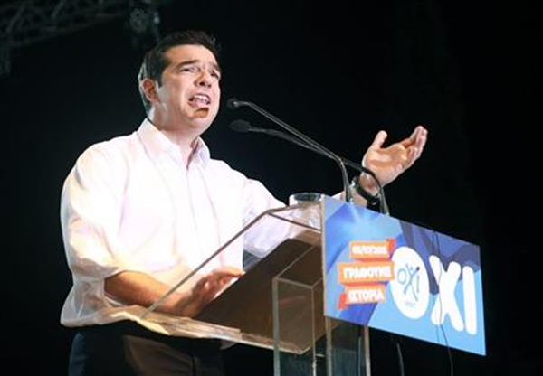 Greece's Prime Minister Alexis Tsipras delivers a speech during a rally organized by supporters of the No vote in Athens, Friday, July 3, 2015. A new opinion poll shows a dead heat in Greece's referendum campaign with just two days to go before Sunday's vote on whether Greeks should accept more austerity in return for bailout loans.nPhoto: AP