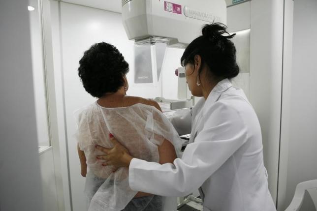 A woman undergoes a free mammogram inside Peru's first mobile unit for breast cancer detection, in Lima March 8, 2012. International Women's Day falls on March 8. REUTERS/Enrique Castro-Mendivil