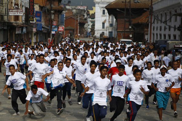 Participants at a marathon to support rebuilding of Kashthamandap, in Basantapur, Kathmandu, on Saturday. Photo: THT