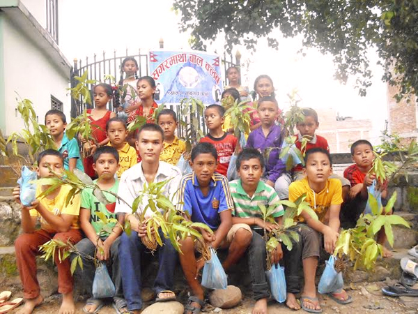 Children of Sagarmatha Child Club in Bhadgau of Byas-1 in Tanahun district prepare plantation in Tanahun, on Saturday, July 04, 2015. The District Soil Conservation Office had provided them saplings for the plantation. Photo: Madan Wagle