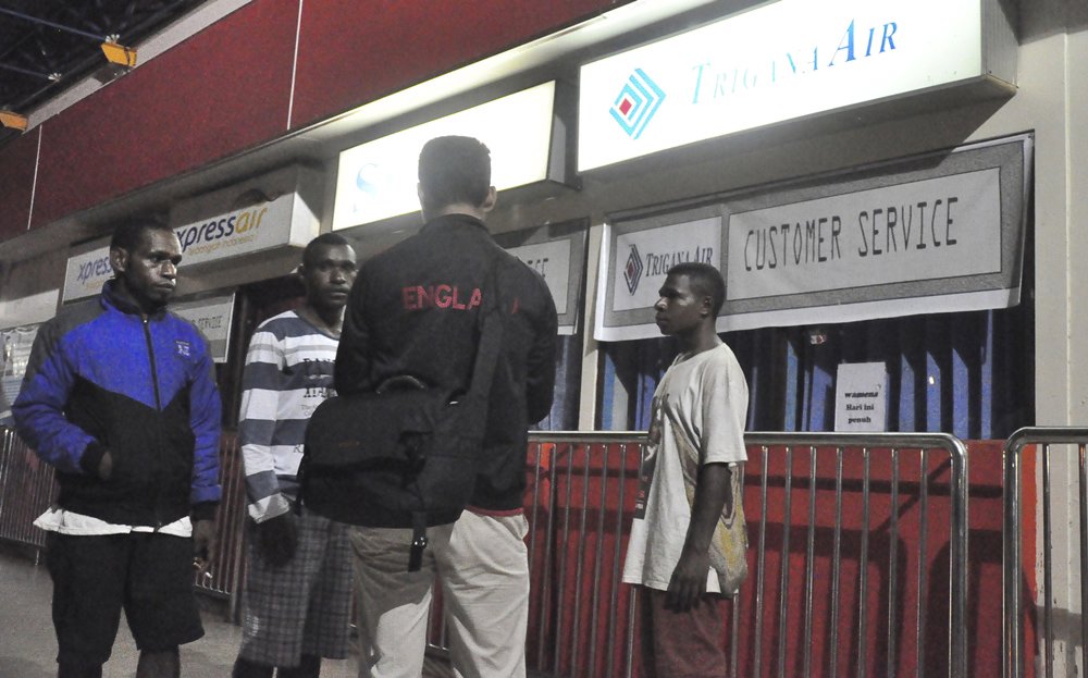 Family members of passengers on a missing Trigana Air flight seek information at Sentani Airport, Jayapura, Papua province, Indonesia on August 16, 2015 in this photo taken by Antara Foto.  An aircraft with 54 people on board crashed in Indonesia's remote and mountainous region of Papua on Sunday, a government official said, the latest in a string of aviation disasters in the Southeast Asian nation. Photo: Reuters