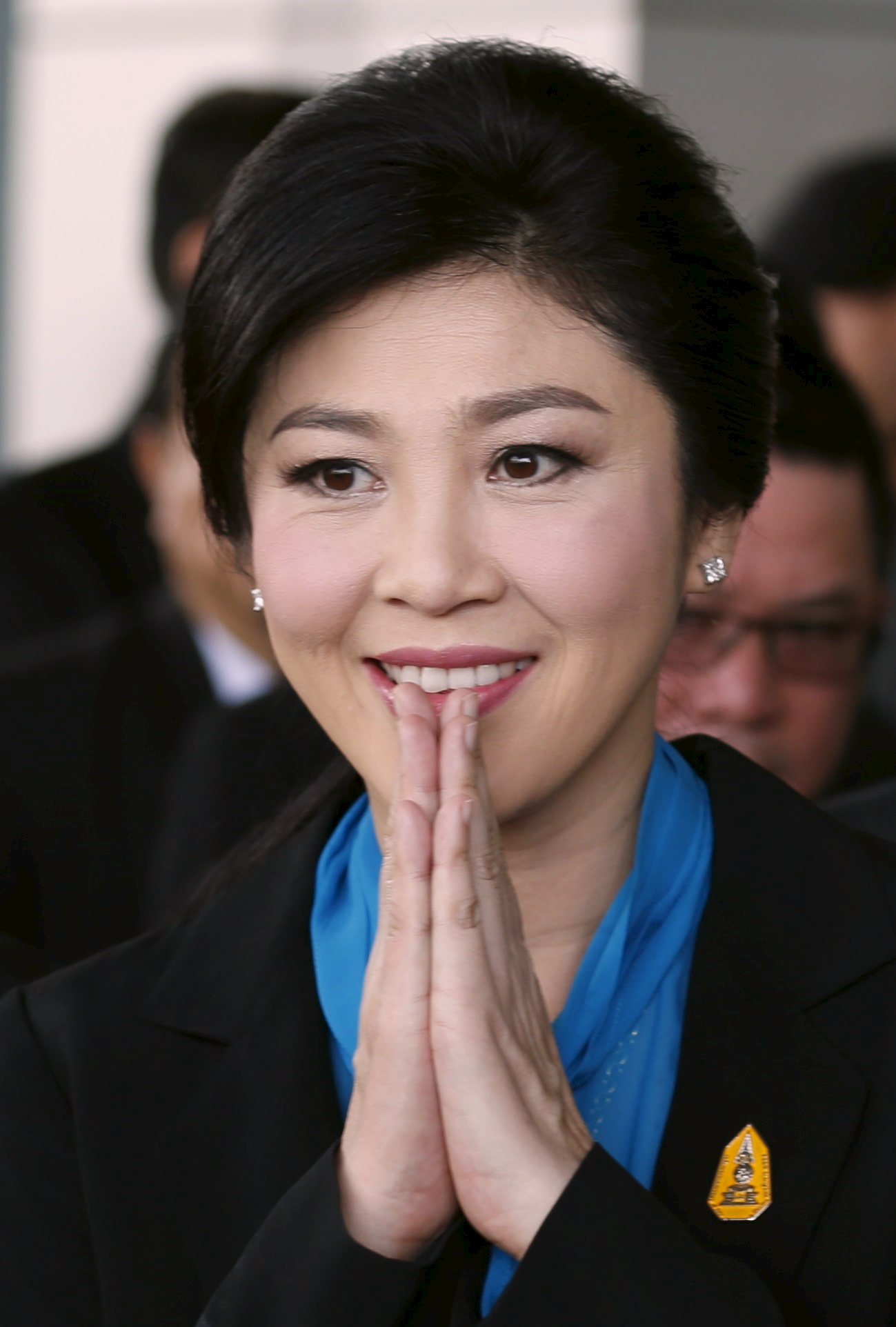 Ousted former Thai Prime Minister Yingluck Shinawatra gestures as she arrives at the Supreme Court in Bangkok, Thailand, August 31, 2015. Former PM Yingluck Shinawatra arrived at Supreme Court Photo: Reuters 