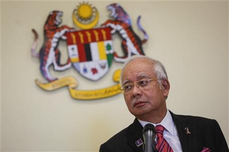 In this Aug. 14, 2015 photo, Malaysian Prime Minister Najib Razak pauses while speaking at a press conference in Putrajaya, Malaysia. Razak has a problem: he can's explain away a $700 million bank account to a skeptical public. Less than a month after leaked documents suggested that $700 million from entities linked to debt-ridden state investment fund 1MDB was funneled into Prime Minister Najib Razaku2019s accounts, he has expelled critics in his government, sacked the attorney-general probing him, suspended two newspapers, blocked a UK-based website and stalled investigations over the scandal. Photo:AP