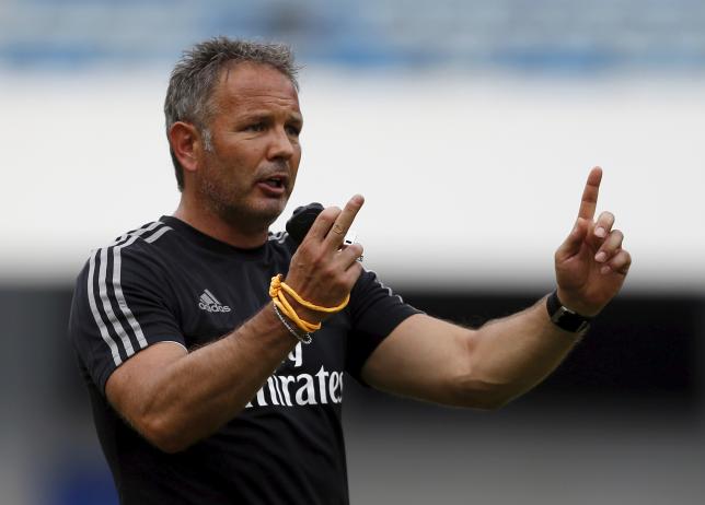 AC Milan coach Sinisa Mihajlovic gestures during a training session in Shenzhen July 24, 2015. REUTERS/Bobby Yip