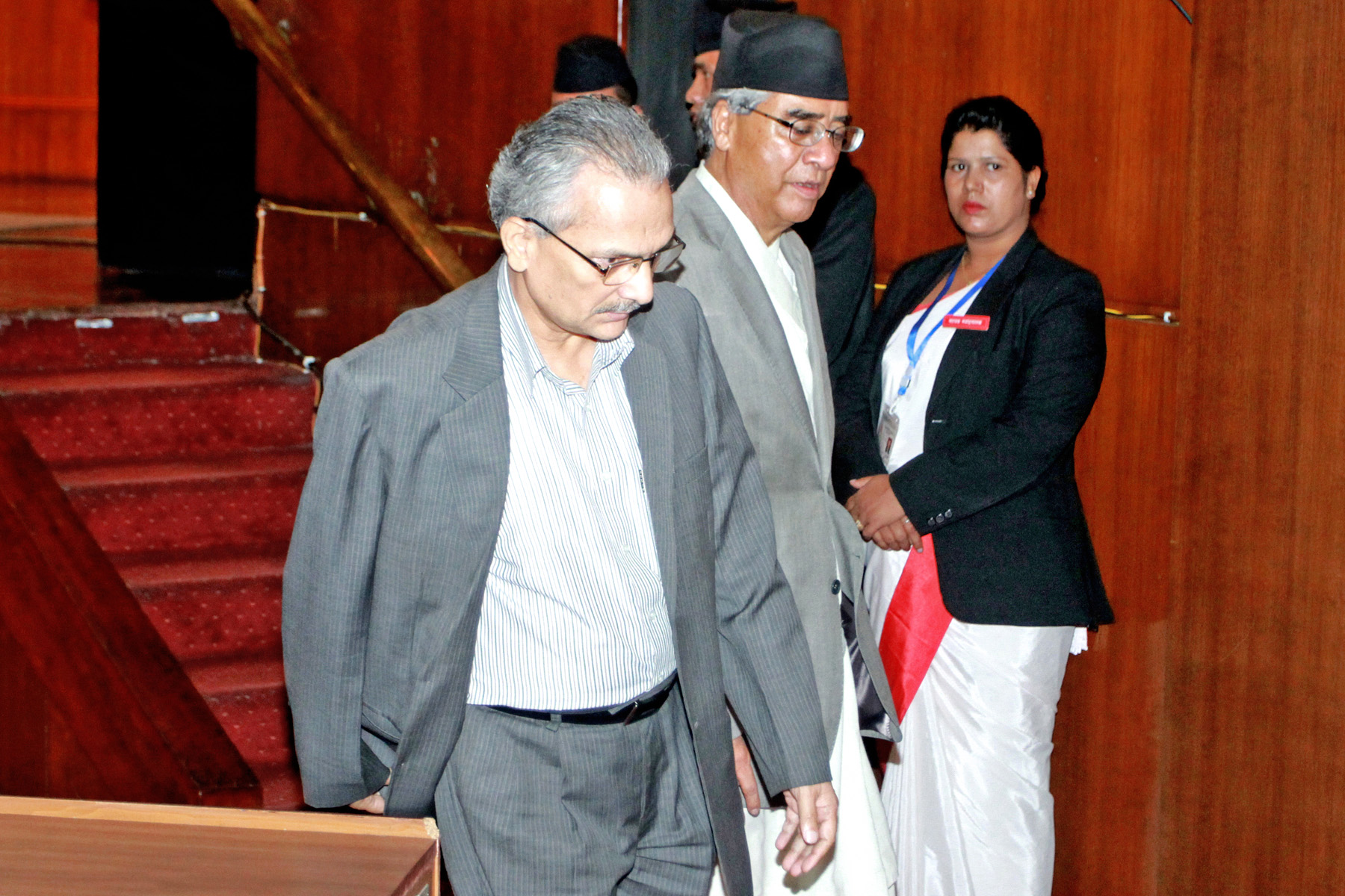 CPDCC Chair Baburam Bhattarai and Nepali Congress leader Sher Bahadur Deuba exiting the CA hall after the meeting concluded on Tuesday, August 11, 2015. Photo: RSS