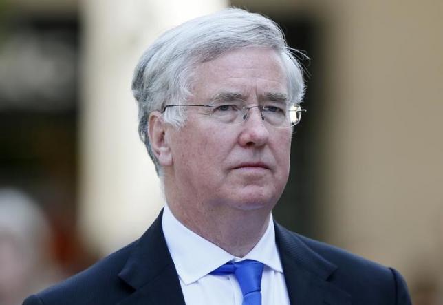 Britain's Defence Secretary Michael Fallon arrives to attend a national service of commemoration to mark the 200th anniversary of the Battle of Waterloo at St Paul's Cathedral in central London, Britain June 18, 2015.  REUTERS/Stefan Wermuth/Files