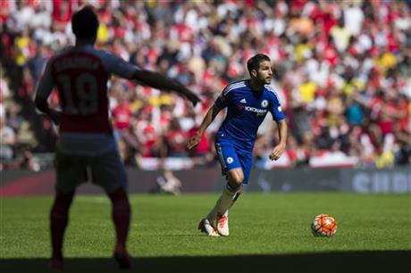 Chelsea's Cesc Fabregas takes the ball downfield during his team's English Community Shield soccer match between Arsenal and Chelsea at Wembley Stadium, London, England, Sunday August 2, 2015. Photo: AP