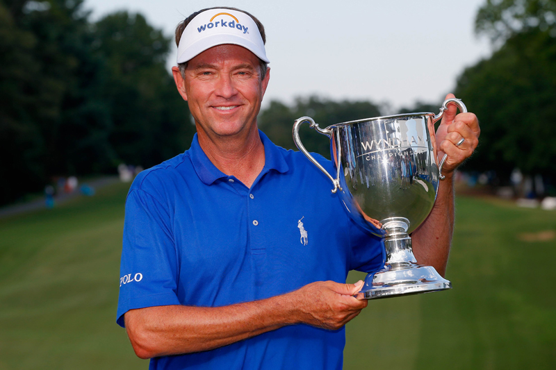 Davis Love III holds the Sam Snead Cup after winning the Wyndham Championship at the Sedgefield Country Club in Greensboro, North Carolina on Sunday.  Photo: AFP