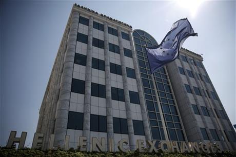 A European Union (EU) flag flutters outside the Athens' Stock Exchange in Athens, Greece, on Monday, August 3, 2015. Photo: AP