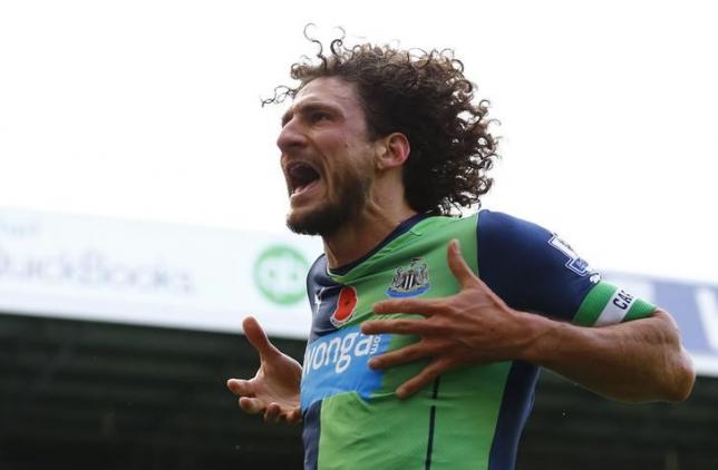 Newcastle United's Fabricio Coloccini celebrates after scoring during their English Premier League soccer match against West Bromwich Albion at The Hawthorns in West Bromwich, central England November 9, 2014. REUTERS/Darren Staples/Files