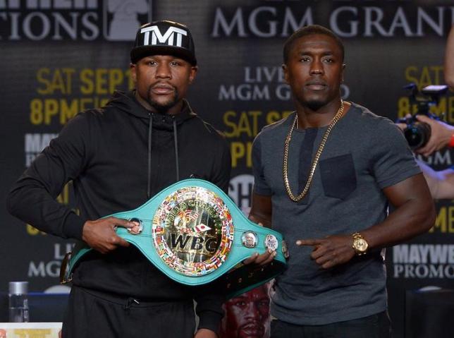 Aug 6, 2015; Los Angeles, CA, USA; Mayweather Promotions CEO Leonard Ellerbe looks on as Floyd Mayweather, Jr. and Andre Berto face off during a press conference to announce the upcoming fight on September 12, 2015 at J.W. Marriott LA Live. Mandatory Credit: Jayne Kamin-Oncea-USA TODAY Sports