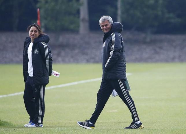 Chelsea's manager Jose Mourinho (R) and team doctor Eva Carneiro attend a training session at Cobham in Surrey, south England April 29, 2014. REUTERS/Eddie Keogh/Files