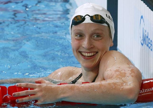 Katie Ledecky of the U.S. reacts after setting a new world record during a women's 1500m freestyle heat during the Aquatics World Championships in Kazan, Russia  August 3, 2015.   Photo: Reuters