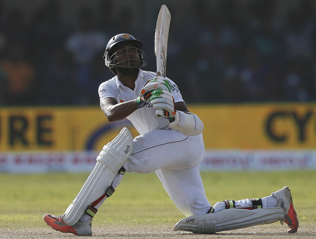 Sri Lanka's Dinesh Chandimal watches his shot during the third day of their first test cricket match against India in Galle August 14, 2015.  Photo: Reuters