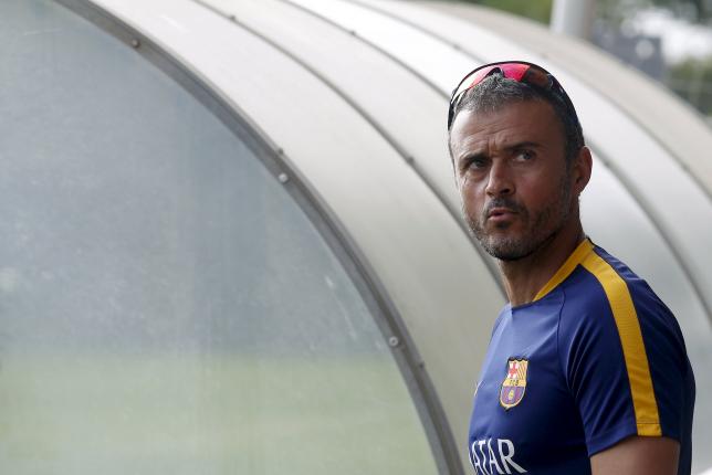Barcelona's soccer coach Luis Enrique attends a training session at Joan Gamper training camp, near Barcelona, Spain, July 31, 2015. REUTERS/Albert Gea