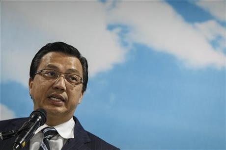 Malaysian Transport Minister Liow Tiong Lai speaks at an event in Shah Alam, Malaysia Wednesday, Aug. 12, 2015. Malaysian officials said Wednesday they are considering to bring back the debris if confirmed to be from Malaysia Airlines Flight 370. AP
