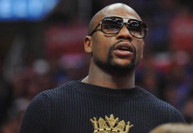 May 8, 2015; Los Angeles, CA, USA; Boxer Floyd Mayweather in attendance as the Houston Rockets play against the Los Angeles Clippers during the first half in game three of the second round of the NBA Playoffs. at Staples Center. Mandatory Credit: Gary A. Vasquez-USA TODAY Sports