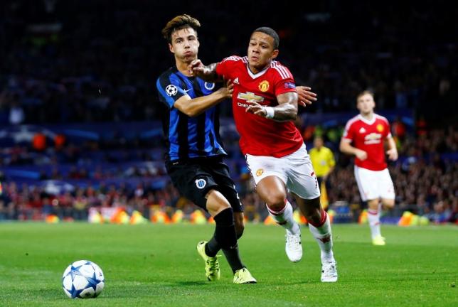Football - Manchester United v Club Brugge - UEFA Champions League Qualifying Play-Off First Leg - Old Trafford, Manchester, England - 18/8/15nManchester United's Memphis Depay in action with Club Brugge's Dion CoolsnReuters / Darren StaplesnLivepicnEDITORIAL USE ONLY.