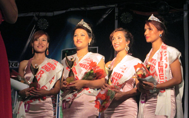 Sujana Shrestha (2nd from left), posing for photograph flanked by First runner-up Sanju Ghale (2nd from right) and Second runner-up Anjana Koirala (left) after winning the titles of Miss Tanahun 2015, organised by Aakala Films and Events on Saturday, August 1, 2015. Photo: Madan Wagle