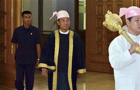 Myanmar Lower House Speaker Shwe Mann, center, arrives to attend a regular session at Parliament in Naypyitaw, Myanmar Tuesday, Aug 18, 2015. AP