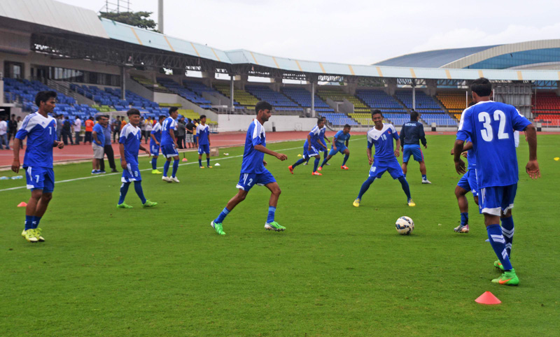 Nepal national team members play football during a training session in Pune on Sunday, on the eve of their friendly match against India at the Belwadi Stadium. Photo: Courtesy NSJF