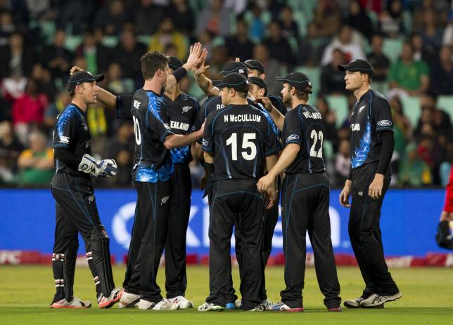 New Zealand celebrate the wicket of South Africa's Hashim Amla (not in picture) during their T20 International cricket match in Durban, August 14, 2015. REUTERS/Rogan Ward