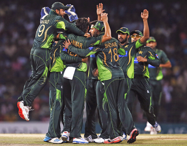 Pakistan's team members celebrate after taking the wicket of Sri Lanka's Kusal Perera during their first Twenty20 match at the Premadasa Stadium in Colombo on Thursday. Photo: REUTERS