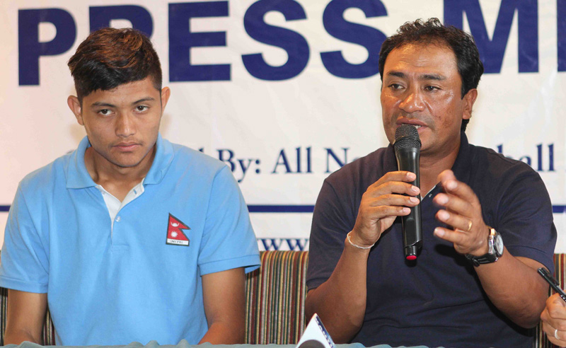 Nepal coach Bal Gopal Maharjan (right) speaks as Bimal Gharti Magar looks on during a press conference in Lalitpur on Wednesday, on the eve of their first SAFF U-19 Championship semi-final match against Afghanistan. Photo: Udipt Singh Chhetry/THT