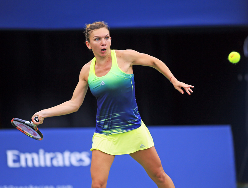Simona Halep of Romania returns to Agnieszka Radwanska of Poland during their Rogers Cup quarter-final match at the  Aviva Centre in Toronto on Friday. Halep won 0-6, 6-3, 6-1. Photo:Reuters