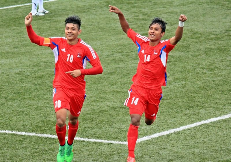 Nepal skipper Bimal Gharti Magar (left) celebrates after scoring a goal against Bhutan in their first match of the SAFF U-19 Championship in Kathmandu, on Thursday, August 20, 2015. Photo: ANFA