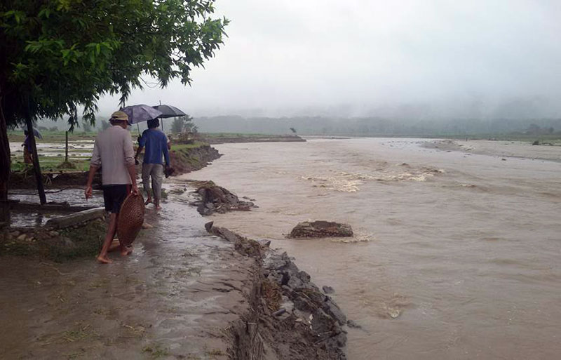 The Riun stream in Madi Municipality-5 of Chitwan district flooding its banks after an incessant rainfall since last night, on Friday, August 21, 2015. The flood has swept away two houses. Photo: Tilak Ram Rimal 