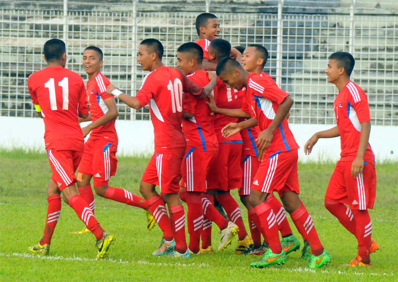 Nepal U-16 team celebrate after winning their first match of the SAFF U-16 Championship against the Maldives at Sylhet Stadium of Bangladesh on Monday , August 10, 2015. Photo: ANFA
