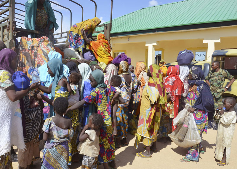 In this Thursday, July. 31, 2015 file photo, women and children rescued by Nigerian soldiers from Boko Haram extremists in the northeast of Nigeria arrive at the military office in Maiduguri. Nigerian troops rescued 178 people from Boko Haram in attacks that destroyed several camps of the Islamic extremists in the northeast of the country, an army statement said Sunday, Aug. 2. Spokesman Col. Tukur Gusau said that 101 of those freed are children, along with 67 women and 10 men. Photo: AP
